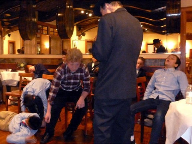 Boys falling out of their seats at a Chicago area bar mitzvah hypnosis show. 