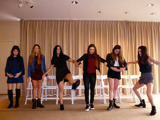 Hypnotized girls dancing at a Chicago area Sweet 16 party hypnosis show.